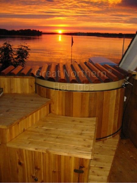 <p>Cedar hot tub and surround deck overlooking Lake Minnetonka at sunrise.</p>