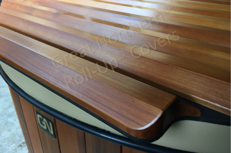 <p>Close up view of a unique solid wood roll-up spa cover.</p>