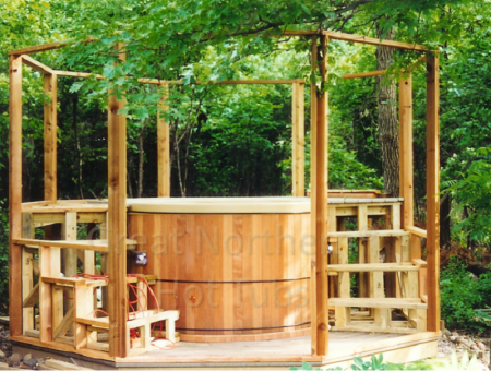 <p>Do-it-yourself gazebo project incorporating a round hot tub and surrounding deck.</p>