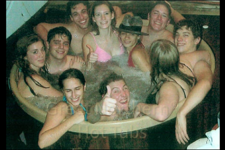 <p>Round hot tub 5 feet in diameter packed with ten teenagers.</p>
