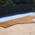 Long custom rollup cover designed to fit a swimming pool for optimal protection and durability