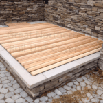 Custom-fit rollup cover designed specifically for a cedar hot tub, ensuring maximum protection and a snug fit