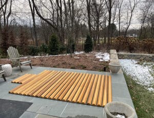 This roll-up cedar cover offers elegant protection, even in the crisp chill of late autumn.